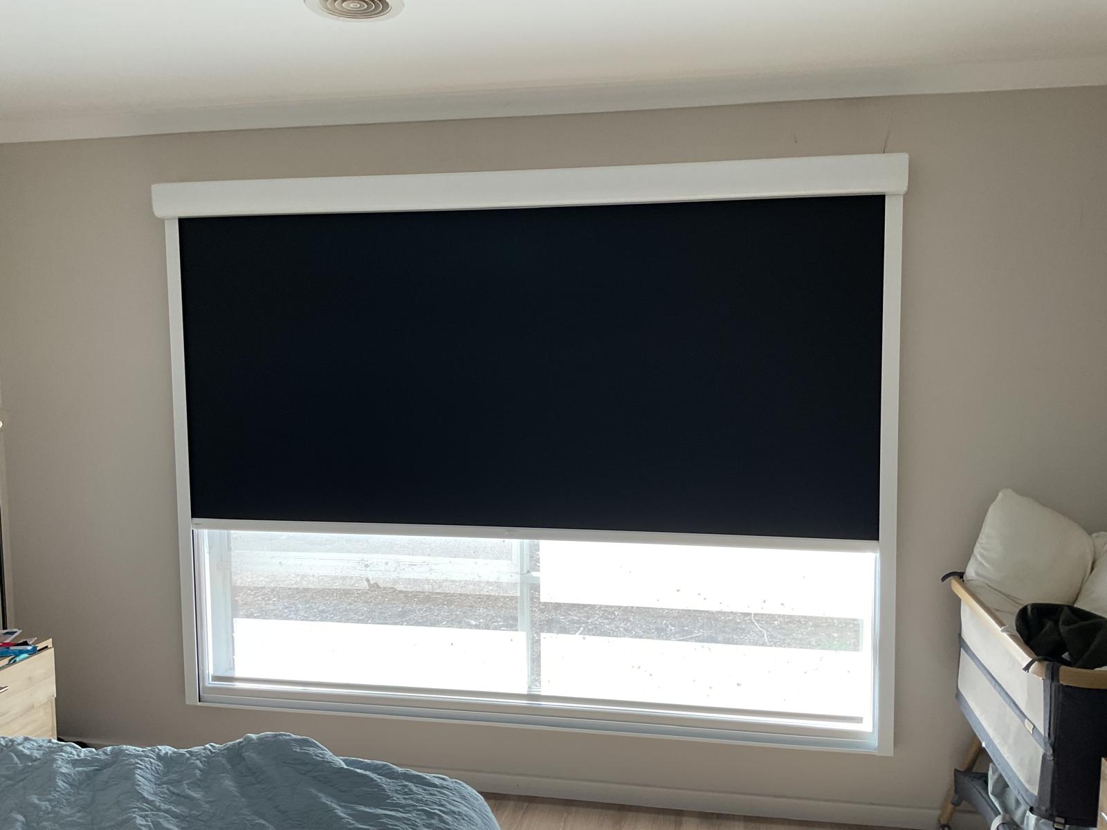 Room-darkening blind in a Melbourne home