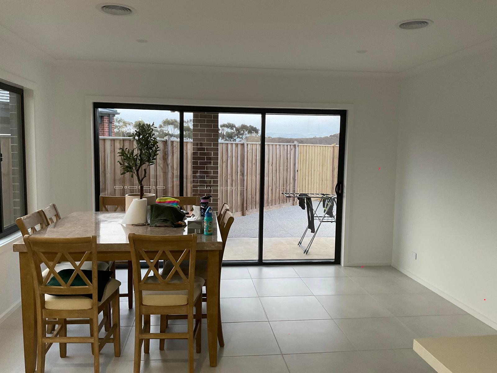 Dining room before sheer curtains