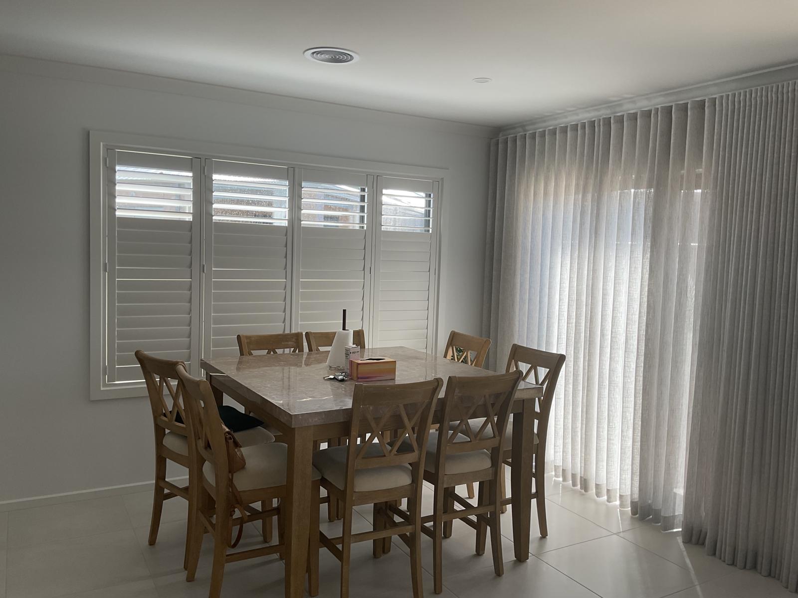 The same dining room after Perfect Fold Sheers