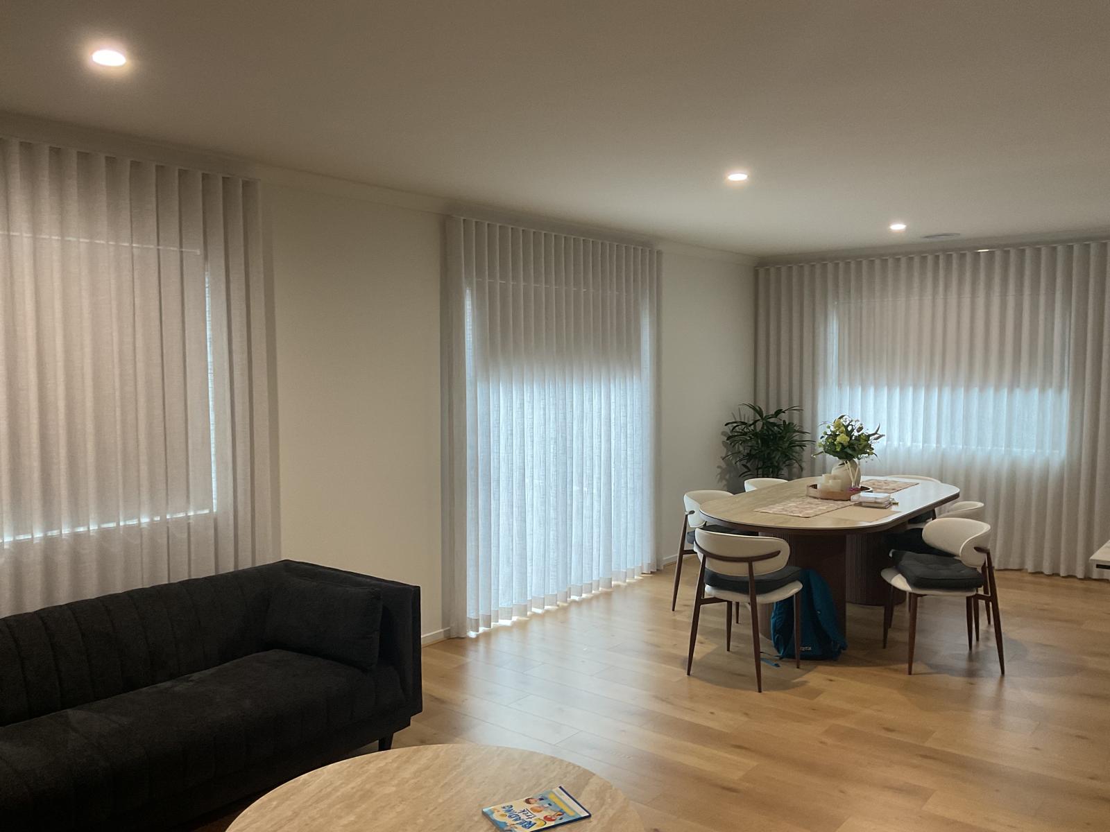 Floor-to-ceiling sheer curtains