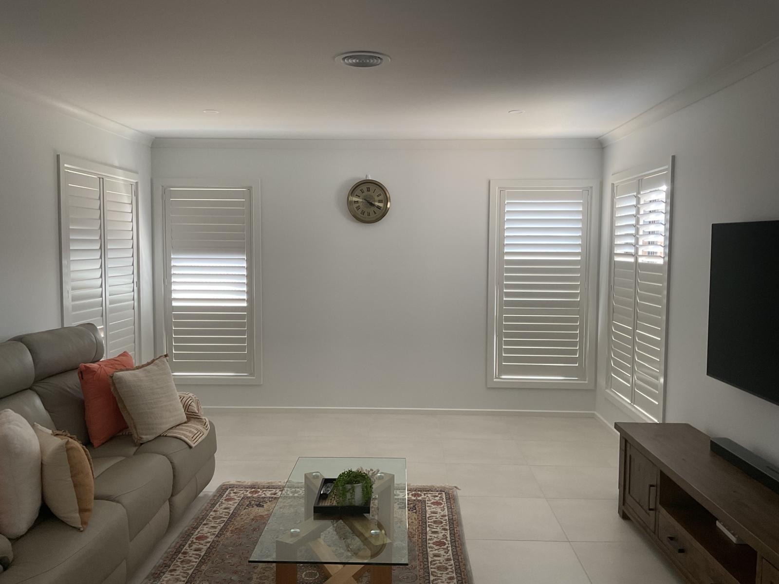 The same living room after Plantation Shutters