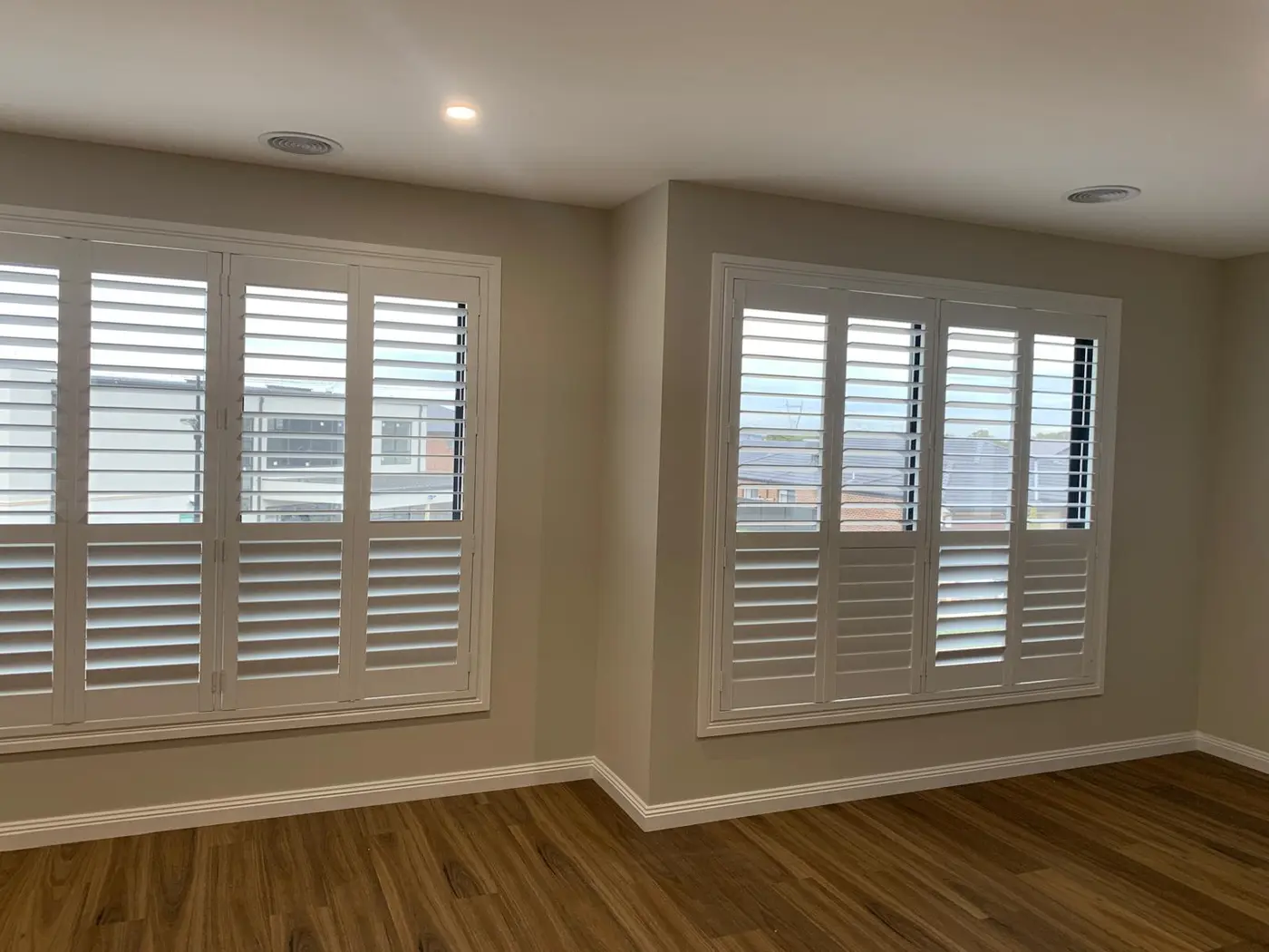 Custom plantation shutters across wide Melbourne windows